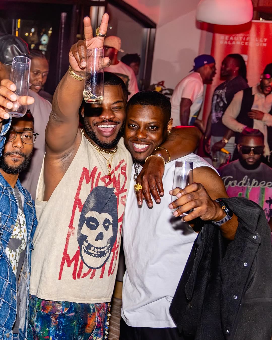 Frens With Benefits guests celebrating at a members-only social event