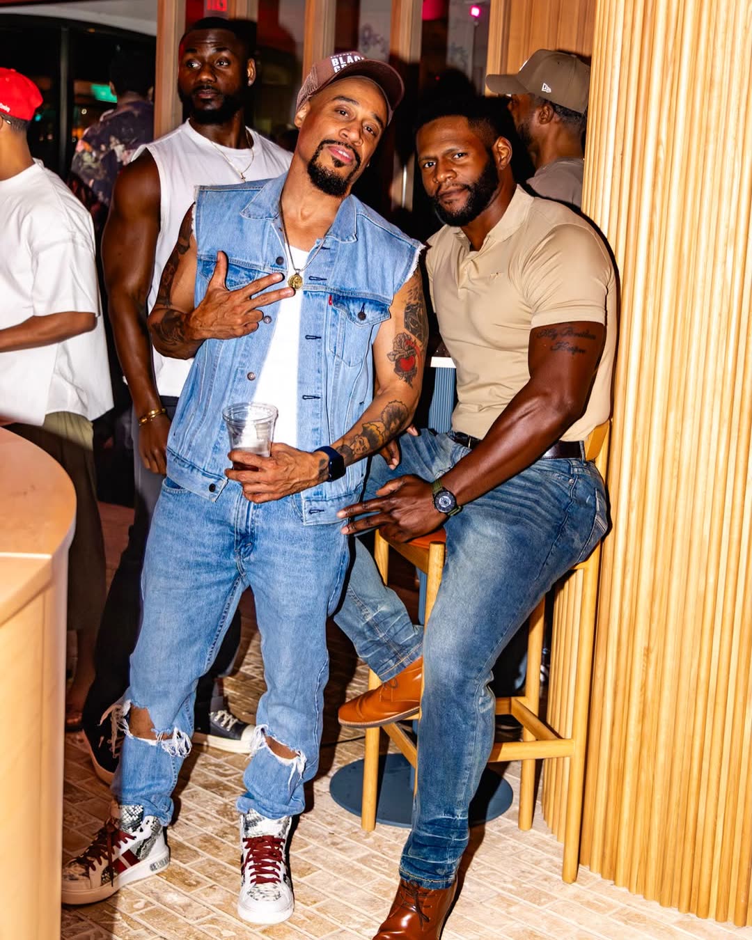 Stylish guests at a Frens With Benefits cocktail party